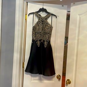 Avery G Gold embellished halter fit and flare  dress. Size 4.From Bloomingdales